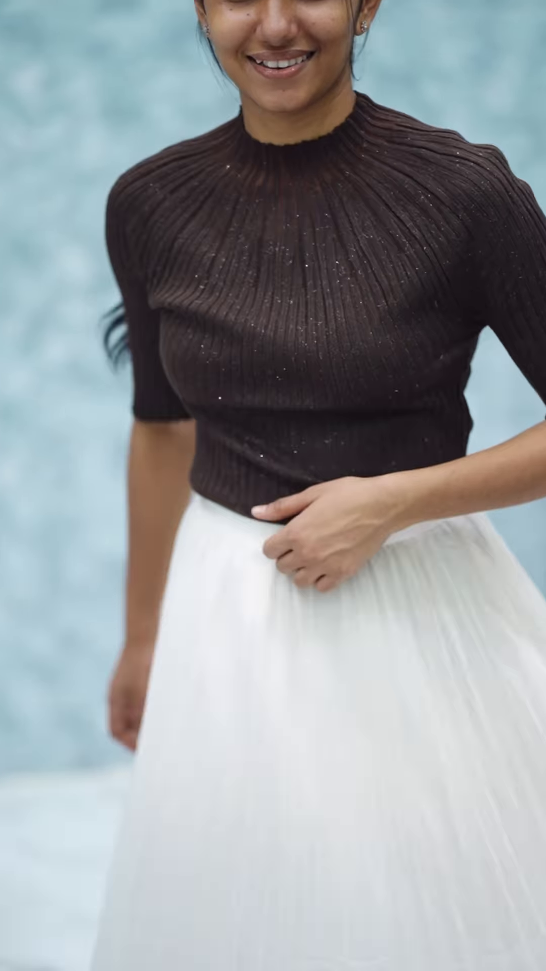 Women’s Pink Ribbed Half-Sleeve Top with Black Pleated Mini Skirt – Chic Contrast Casualwear Ensemble - Image 8