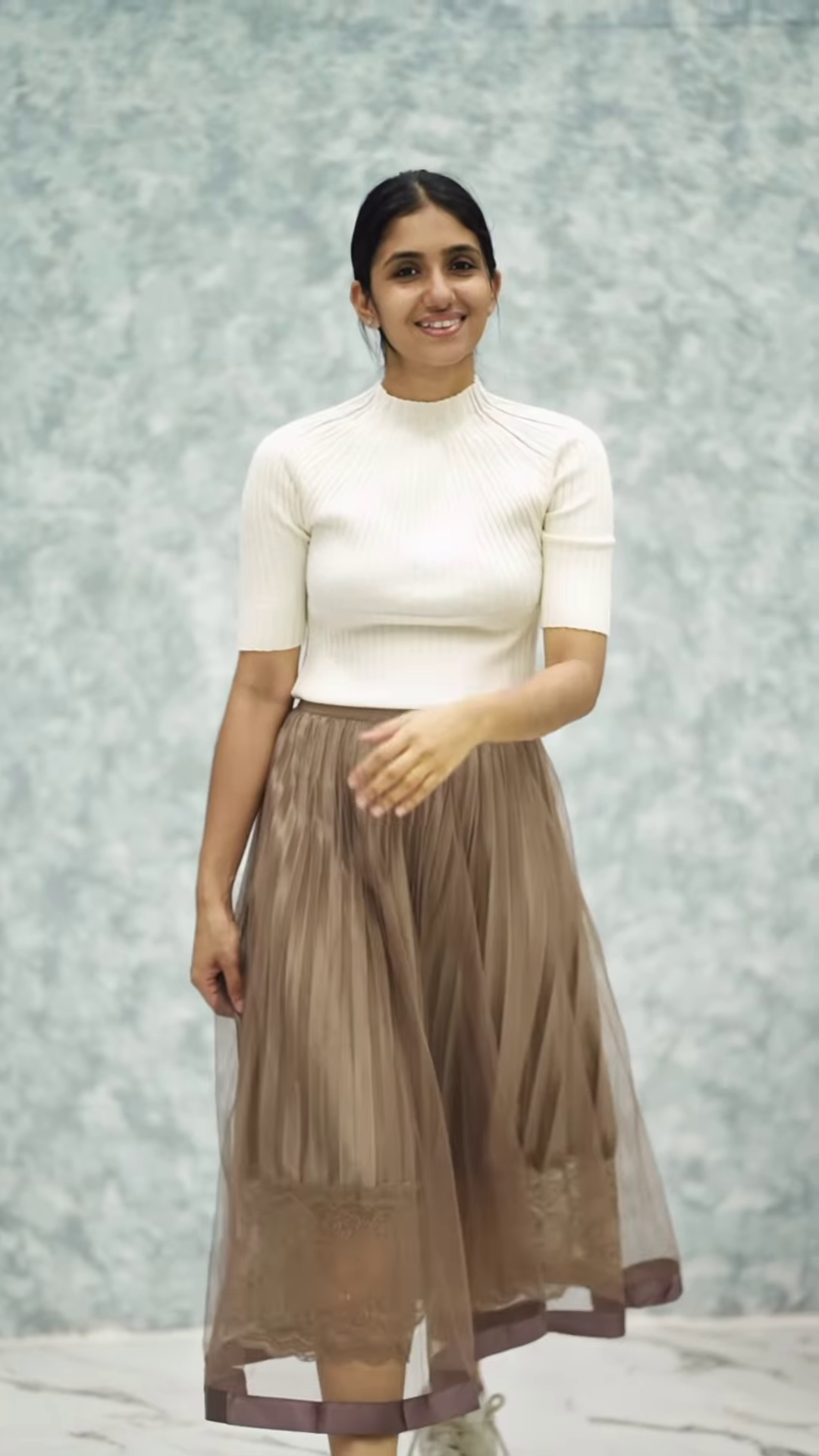 Women’s Pink Ribbed Half-Sleeve Top with Black Pleated Mini Skirt – Chic Contrast Casualwear Ensemble - Image 4