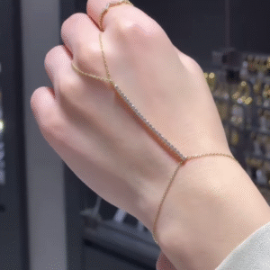 Delicate Gold-Plated Hand Chain Bracelet with Cubic Zirconia Bar - Adjustable Finger Ring Detail