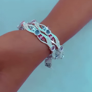 Elegant Silver-Toned Bangle Set with Intricate Filigree and Gemstone Accents