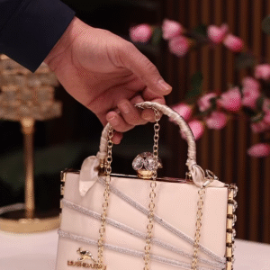 Elegant Ivory Clutch with Rhinestone Embellishments and Chain Strap