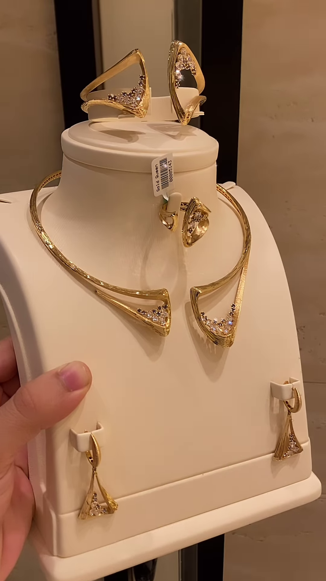 Modern Gold-Toned Jewelry Set with Geometric Cutouts and Crystal Accents - Necklace, Bracelet, Ring, Earrings