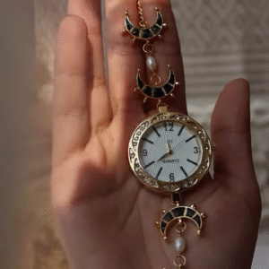 Whimsical Gold-Toned Wristwatch with Crescent Moon and Pearl Accents - Celestial Timepiece