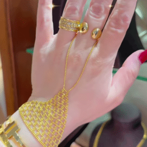 Ornate Gold-Toned Hand Chain Bracelet with Intricate Mesh and Ring Attachments