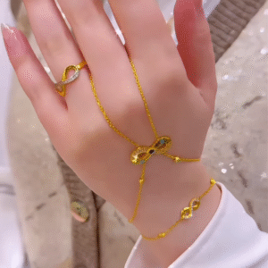 Elegant Gold-Toned Hand Chain Bracelet with Infinity Symbol and Sparkling Accents - Connected Ring